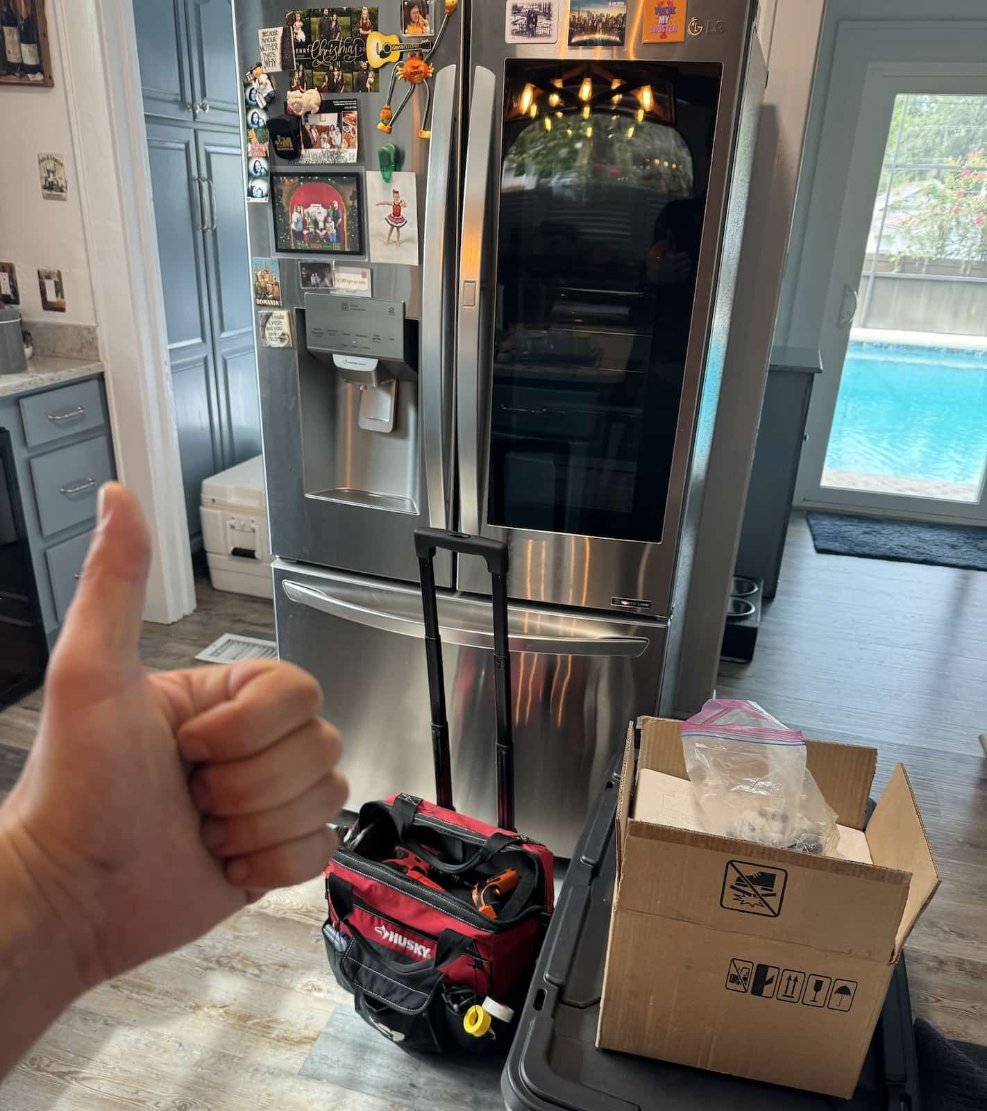 Appliance repair technician diagnosing a household appliance